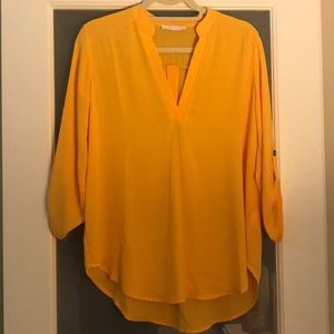 Lush perfect tunic with rolled tan sleeves.